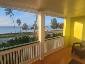 view of ocean from balcony during sunset hour