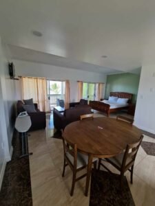 Room with tables,chairs and bed