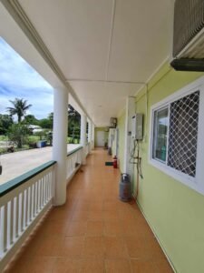 Outside balcony area with gas bottles on the floor