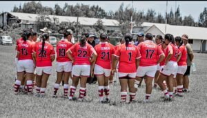 Sports team standing in a circle 